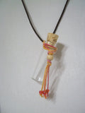 Basic vial necklace on brown leather cording