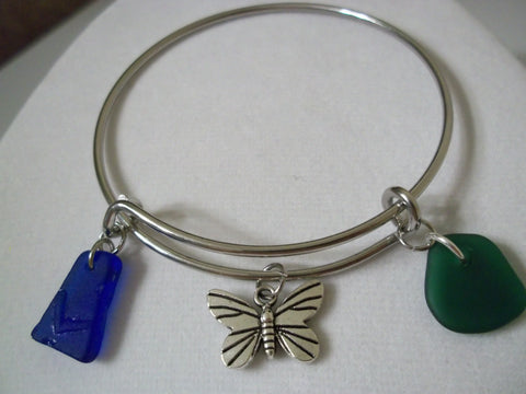 Adjustable stainless steel bracelet with butterfly charm